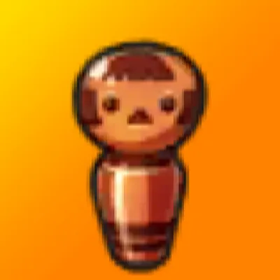 銅のこけしの画像