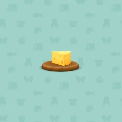 ウッドプレートにのったチーズの画像